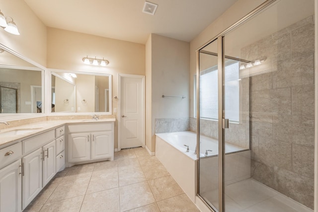 bathroom featuring visible vents, a stall shower, a sink, double vanity, and a bath