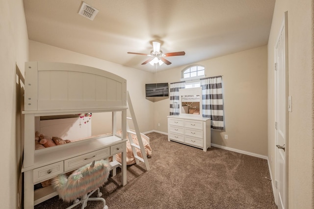 bedroom with visible vents, carpet floors, baseboards, and a ceiling fan