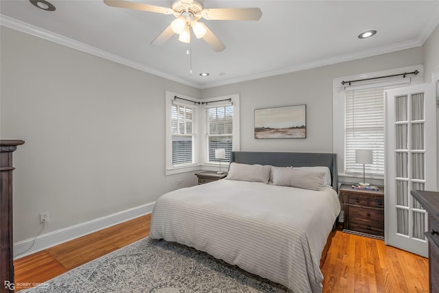 bedroom with crown molding, recessed lighting, baseboards, and light wood-type flooring