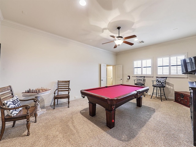 recreation room featuring visible vents, light carpet, baseboards, and crown molding