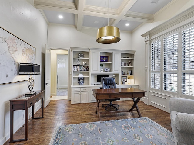 office space featuring dark wood-type flooring, beamed ceiling, ornamental molding, a towering ceiling, and coffered ceiling