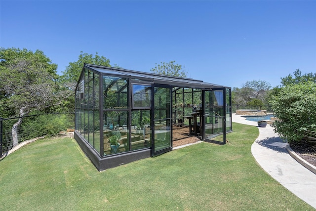 exterior space with fence private yard and an outdoor pool
