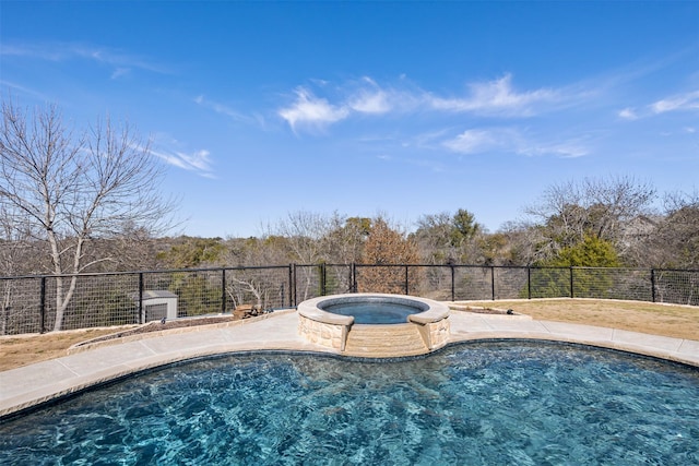 view of pool featuring fence, an in ground hot tub, and a fenced in pool