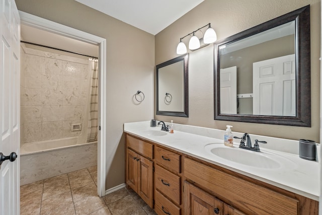 bathroom featuring double vanity, tile patterned floors, shower / bathtub combination with curtain, and a sink