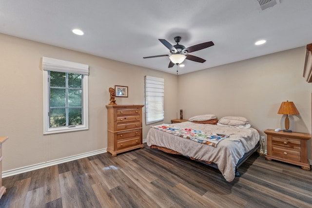 bedroom featuring visible vents, recessed lighting, baseboards, and wood finished floors