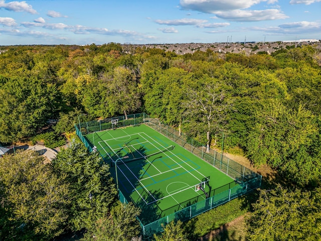 birds eye view of property with a wooded view