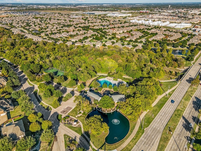 bird's eye view featuring a residential view and a water view