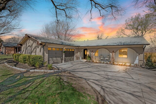 living area featuring a brick fireplace, vaulted ceiling with beams, baseboards, and wood finished floors