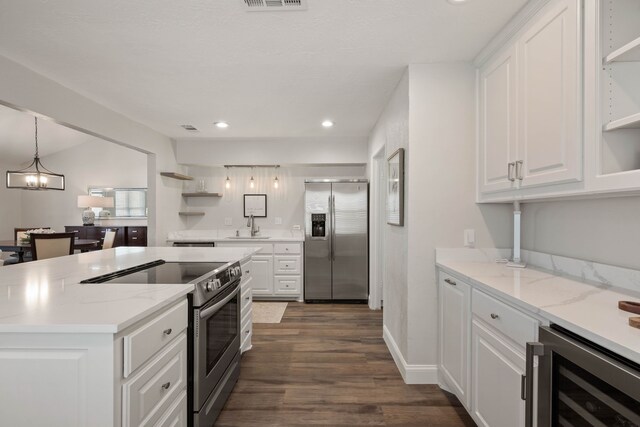 kitchen with wine cooler, white cabinetry, stainless steel appliances, and open shelves