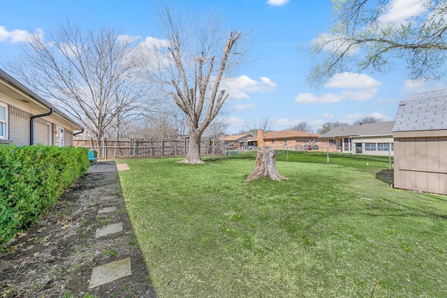 view of yard featuring fence