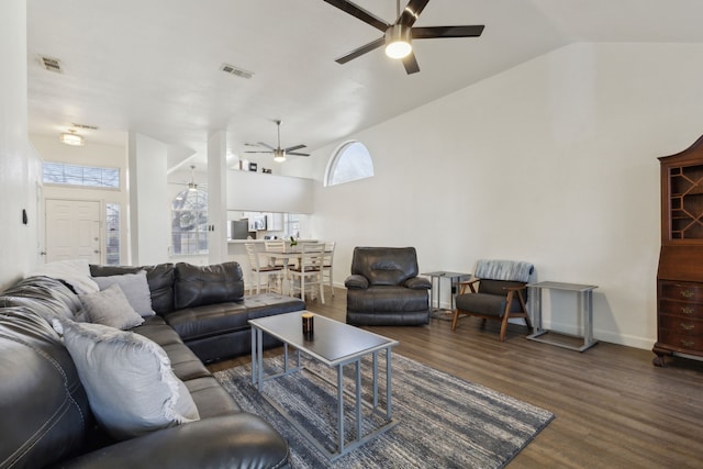 living room featuring high vaulted ceiling, wood finished floors, visible vents, and ceiling fan