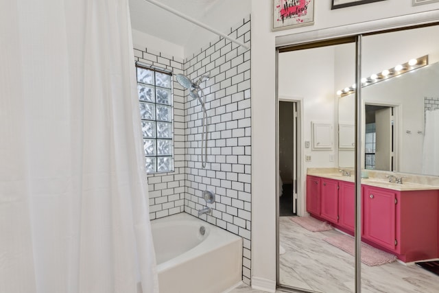 full bathroom featuring double vanity, shower / tub combo, and a sink