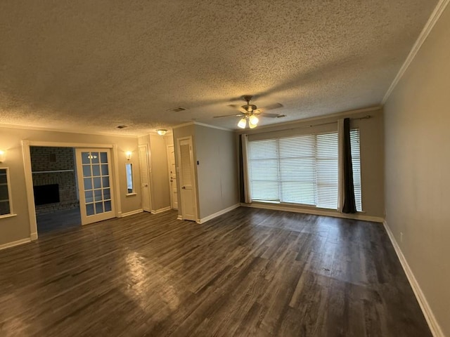 unfurnished living room featuring baseboards, a brick fireplace, dark wood finished floors, and ornamental molding