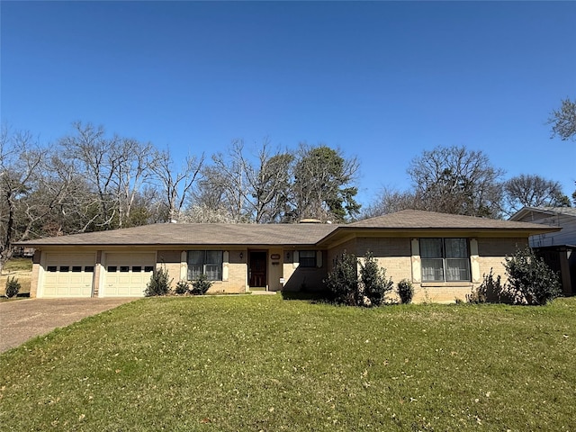 ranch-style house featuring brick siding, a garage, concrete driveway, and a front yard