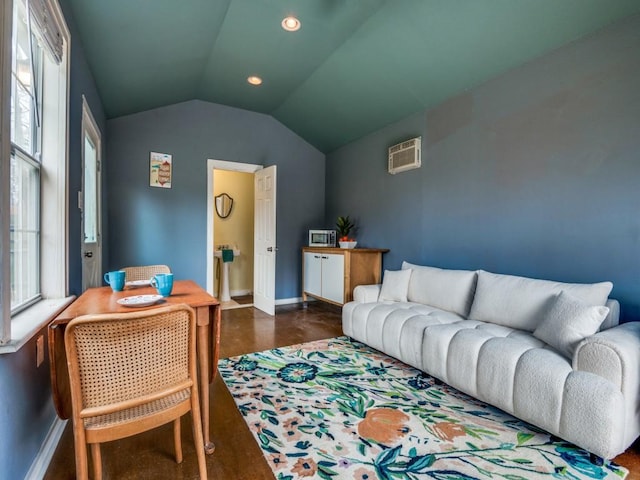 living area with recessed lighting, baseboards, a wall mounted air conditioner, and vaulted ceiling