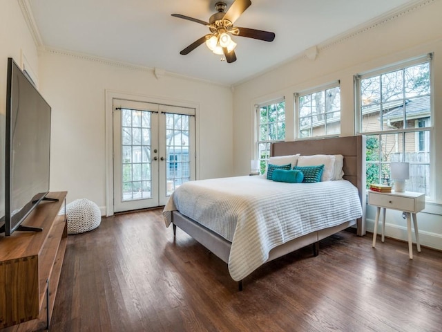 bedroom with ornamental molding, wood finished floors, french doors, baseboards, and access to exterior