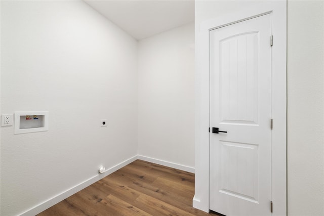 laundry room featuring baseboards, laundry area, hookup for a washing machine, wood finished floors, and electric dryer hookup