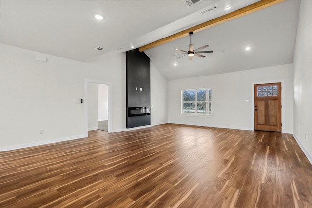 unfurnished living room featuring a ceiling fan, beam ceiling, dark wood-style floors, and baseboards