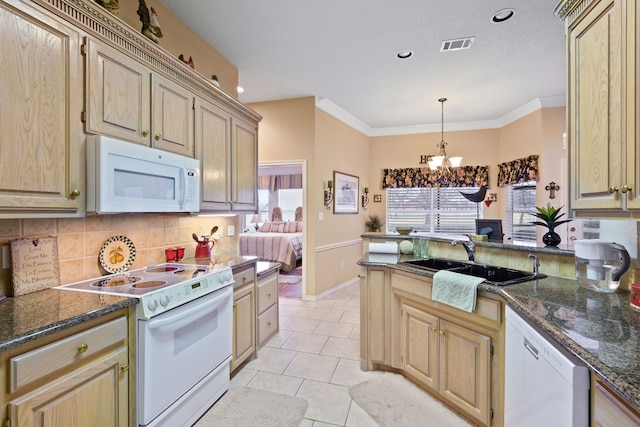 kitchen with white appliances, light tile patterned floors, visible vents, decorative backsplash, and crown molding