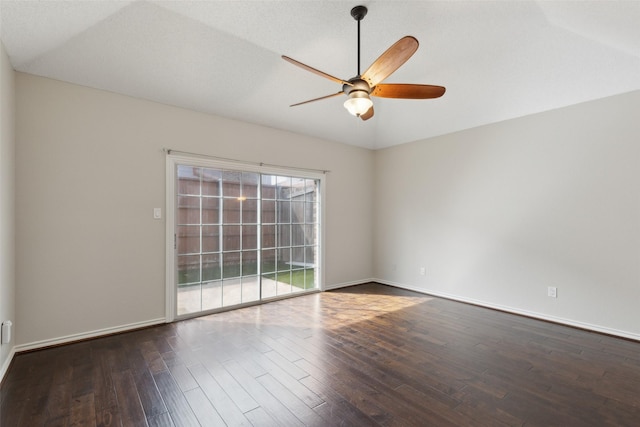 unfurnished room with baseboards, ceiling fan, and wood finished floors