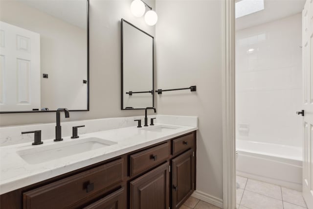 full bathroom featuring a sink, shower / tub combination, double vanity, and tile patterned flooring