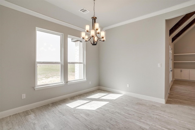 unfurnished room with visible vents, ornamental molding, light wood-style flooring, baseboards, and a chandelier