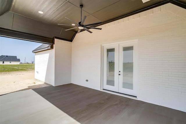 view of patio with french doors and ceiling fan