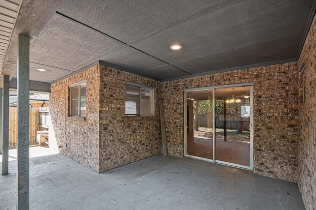 view of patio featuring fence