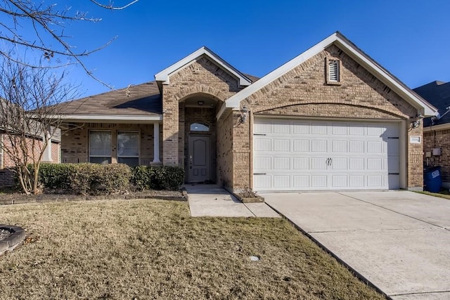 ranch-style home featuring brick siding, concrete driveway, and a garage