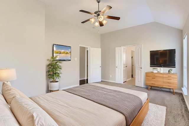 bedroom with vaulted ceiling, baseboards, carpet floors, and ceiling fan