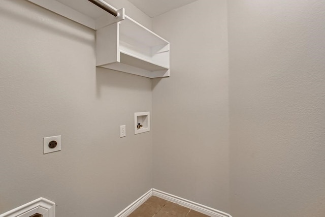 washroom featuring baseboards, laundry area, electric dryer hookup, washer hookup, and tile patterned flooring