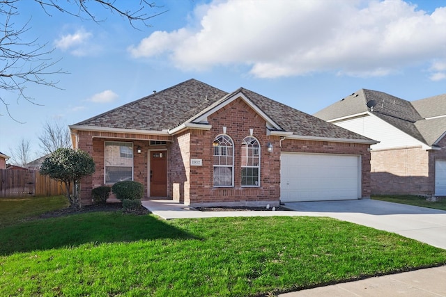 ranch-style house with fence, driveway, roof with shingles, a front lawn, and a garage