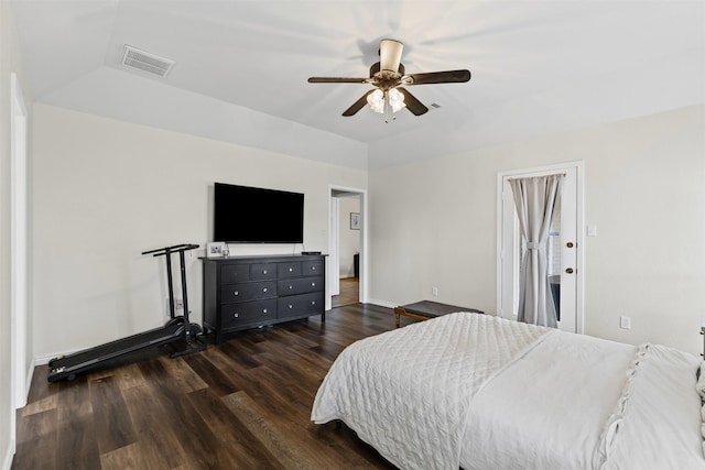 bedroom with visible vents, ceiling fan, baseboards, vaulted ceiling, and wood finished floors