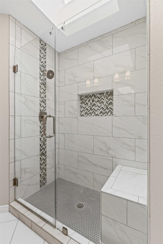 full bathroom featuring a shower stall