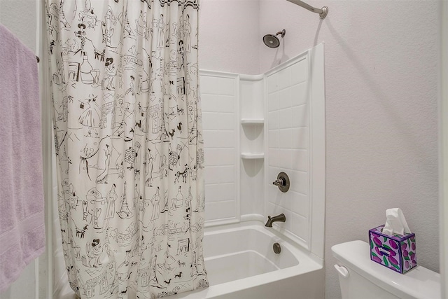 full bathroom with toilet, a textured wall, and shower / tub combo with curtain