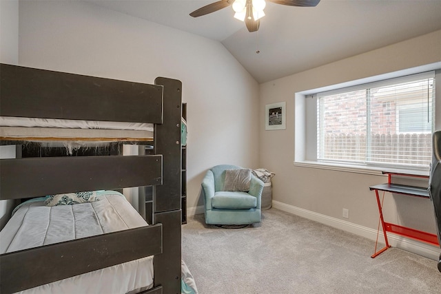 bedroom featuring lofted ceiling, carpet flooring, a ceiling fan, and baseboards