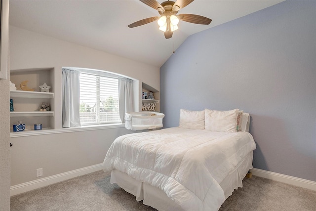 bedroom featuring vaulted ceiling, carpet, and baseboards