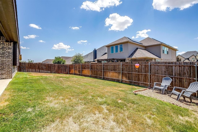 view of yard featuring a fenced backyard