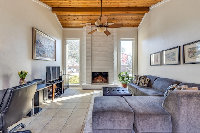 9137 Windy Crest Dr, Dallas, TX 75243 - living area featuring wooden ceiling, light tile patterned floors, a ceiling fan, and a brick fireplace