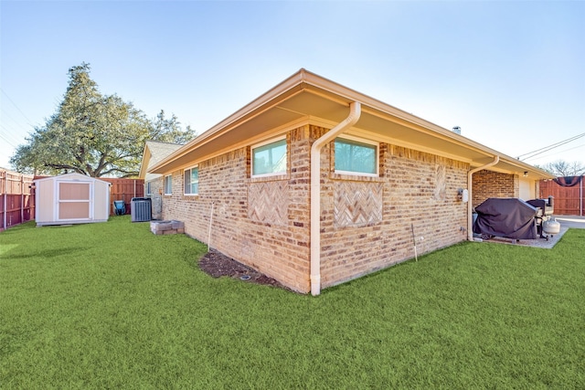 view of property exterior with a storage shed, cooling unit, fence, and an outdoor structure