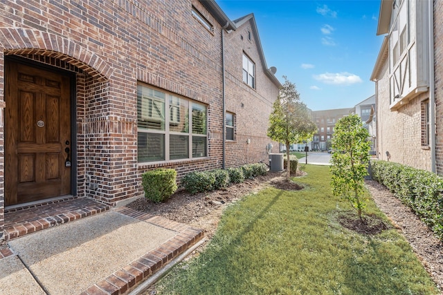 view of yard featuring central AC unit