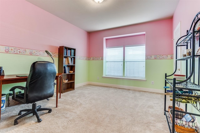 office space with baseboards and carpet