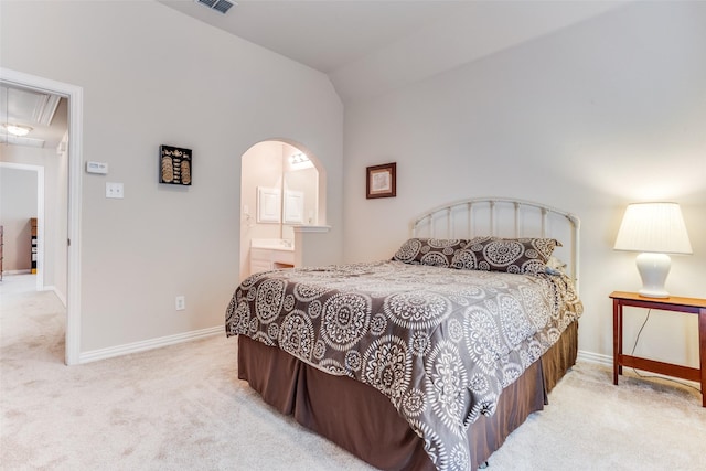 bedroom featuring baseboards, visible vents, attic access, lofted ceiling, and carpet flooring