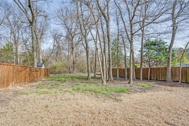 view of yard with fence