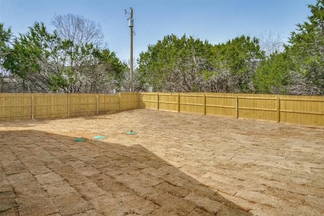 view of yard featuring fence