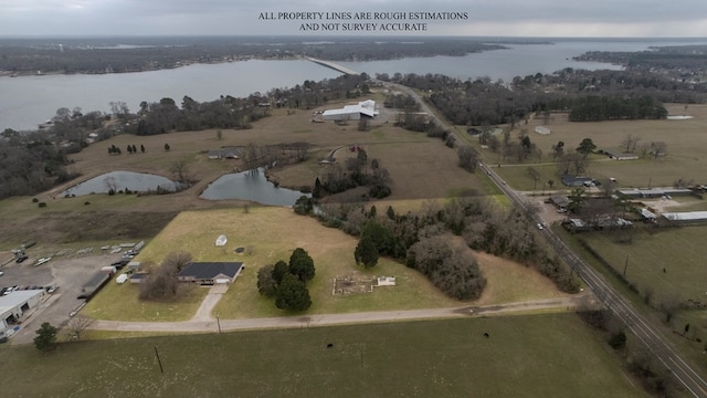 bird's eye view with a rural view and a water view