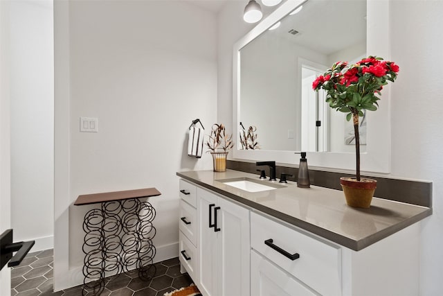 141 Perth Ct, Argyle, TX 76226 - bathroom with vanity, baseboards, and tile patterned floors