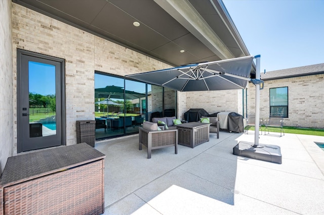 view of patio featuring grilling area and an outdoor living space