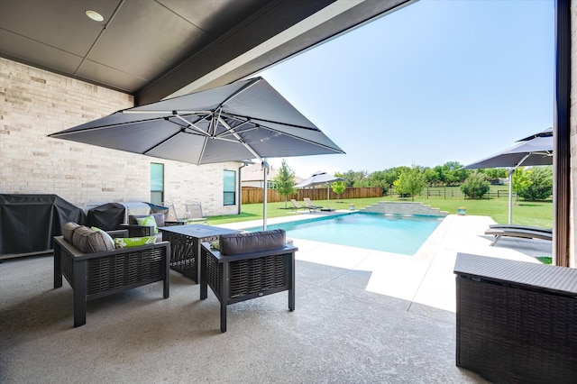 view of pool featuring a lawn, a patio area, a fenced in pool, and a fenced backyard