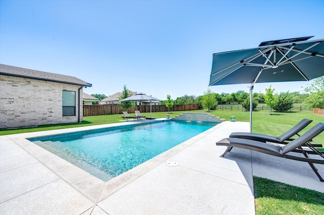 view of pool featuring a fenced backyard, a yard, a fenced in pool, and a patio area